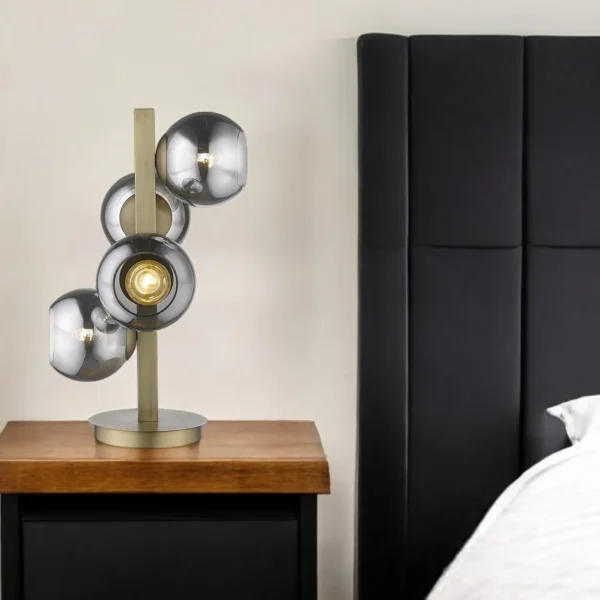 24" Brass Metal Four Light Novelty Table Lamp With Silver Metallic Globe Shades