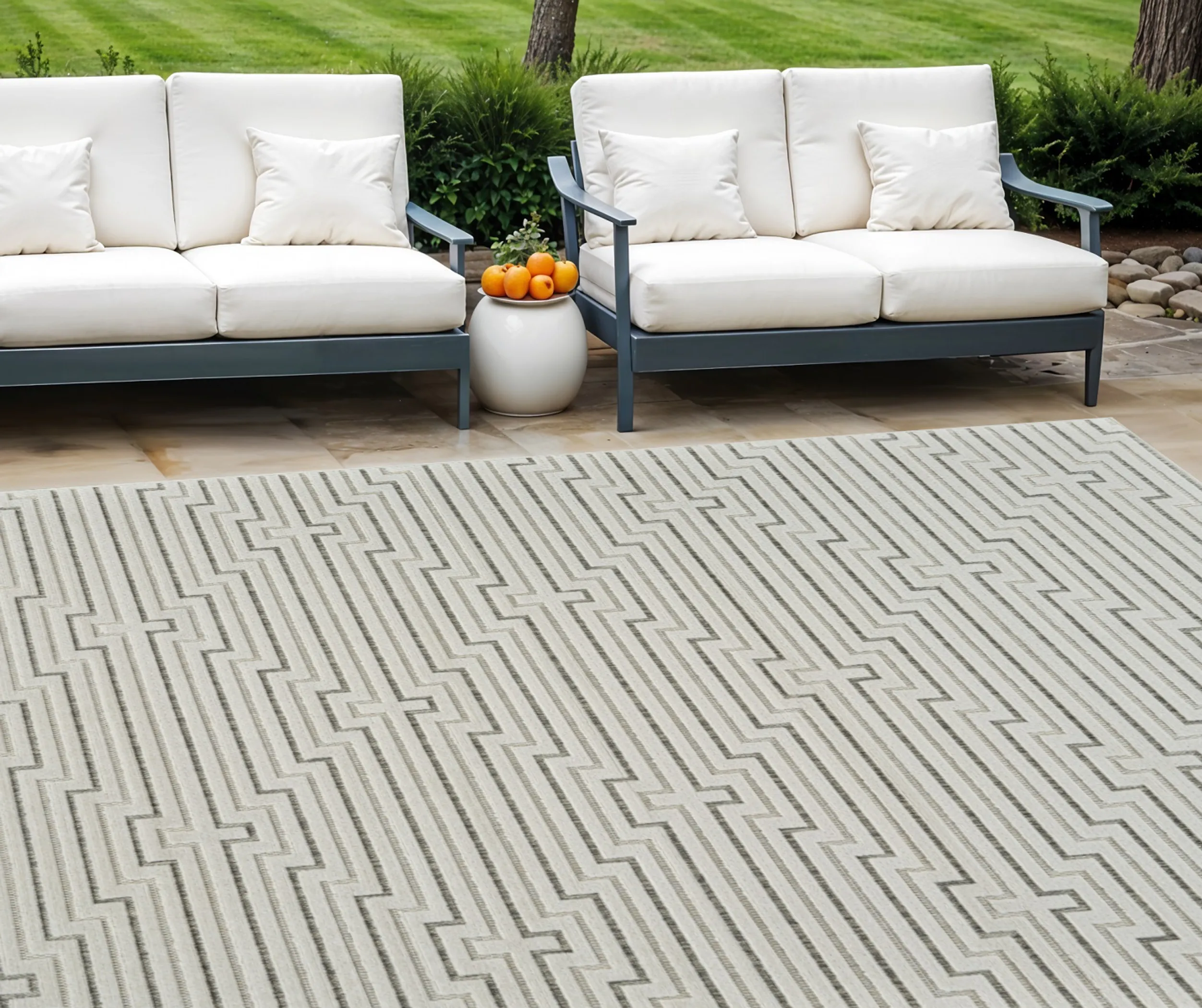 6' X 9' Cream and Beige Geometric Distressed Indoor Outdoor Area Rug