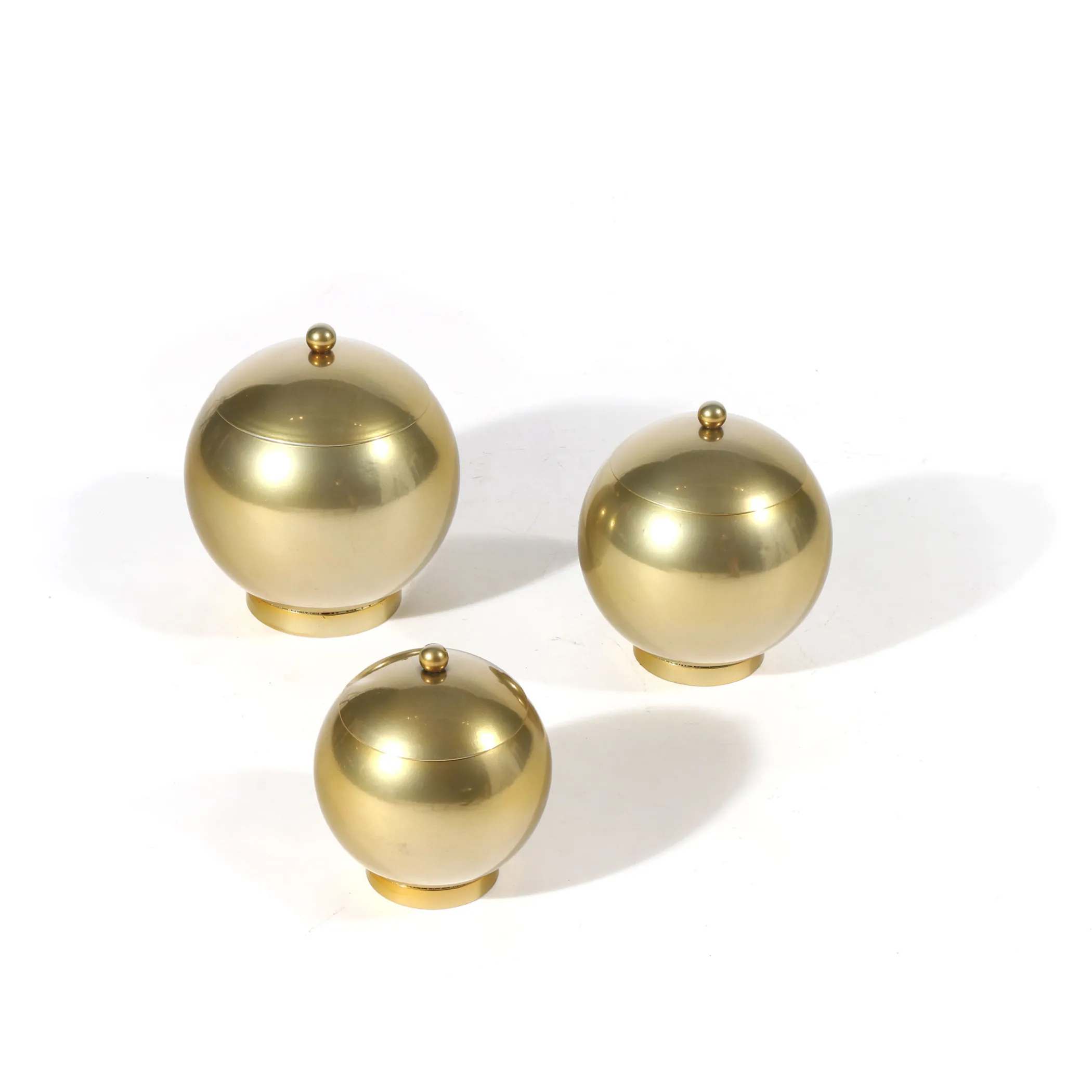 Set of Three Gold Metal Decorative Lidded Canisters - Image 2