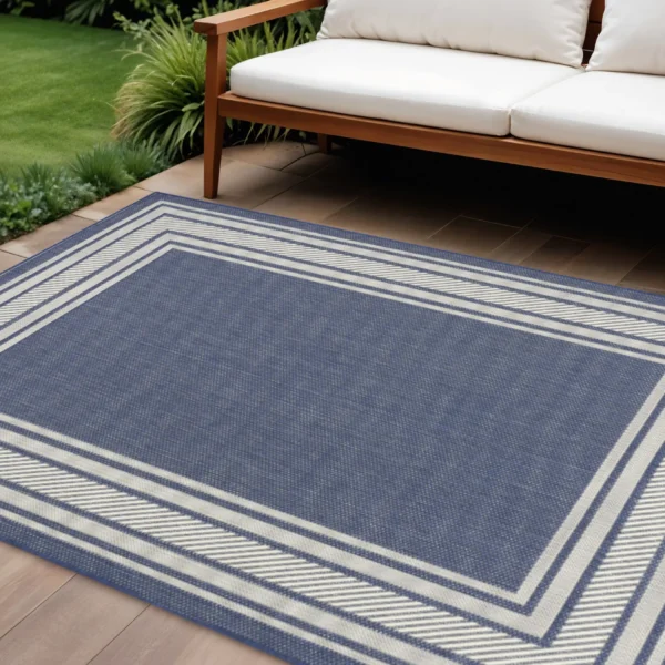 6' X 9' Navy Blue And Ivory Geometric Indoor Outdoor Area Rug
