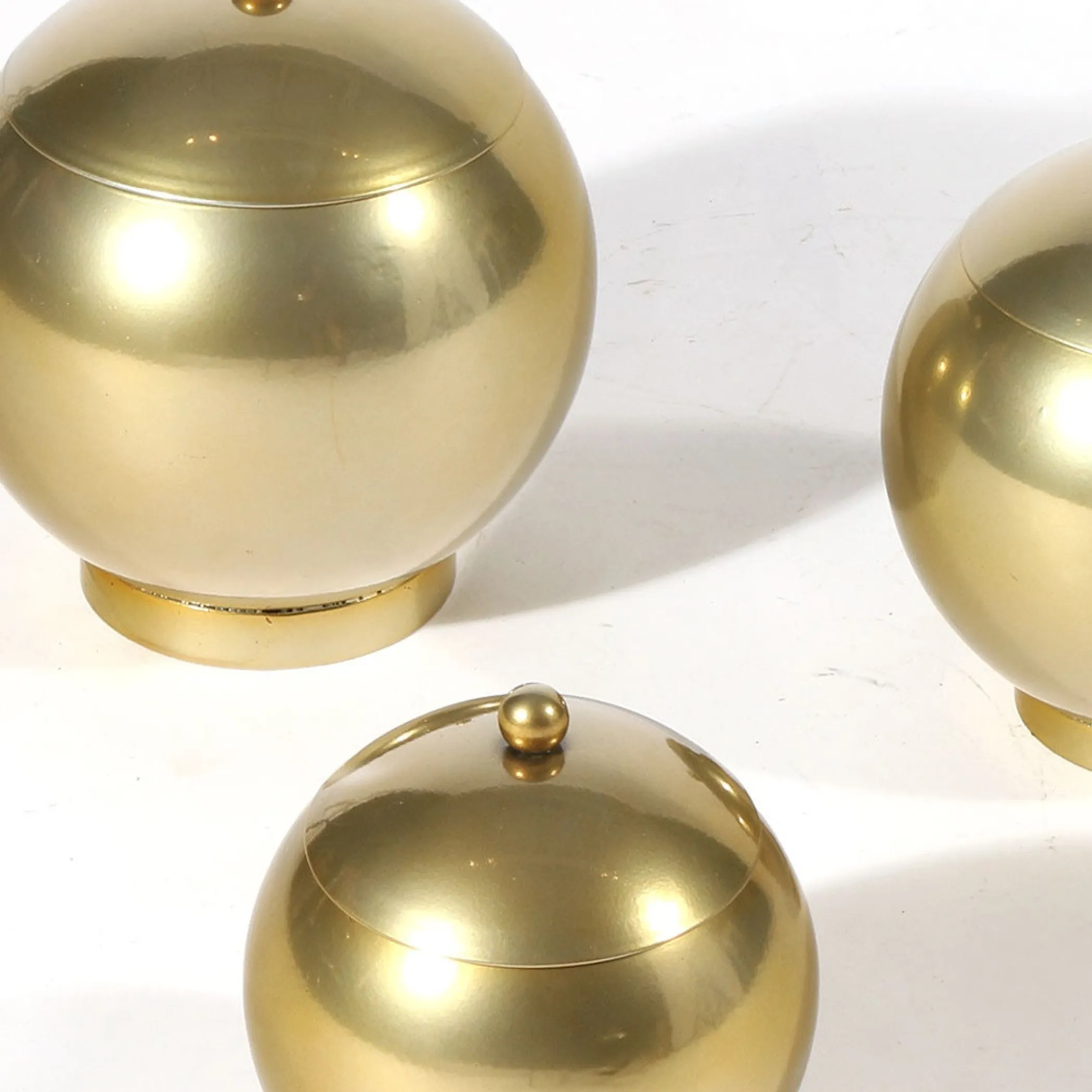 Set of Three Gold Metal Decorative Lidded Canisters - Image 4